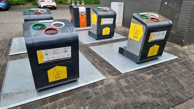 Gevaarlijke taferelen door brekende kettingen van glasbakken in Eindhoven