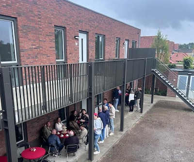 Sleutels en broodjes voor bewoners nieuwe appartementen