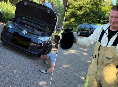 Kitten zit vast onder motorkap in Eersel, brandweerlieden en agenten schieten te hulp