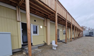 Astenaar kon eerst geld verdienen aan arbeidsmigranten, maar maakt nu bezwaar tegen komst woonunits